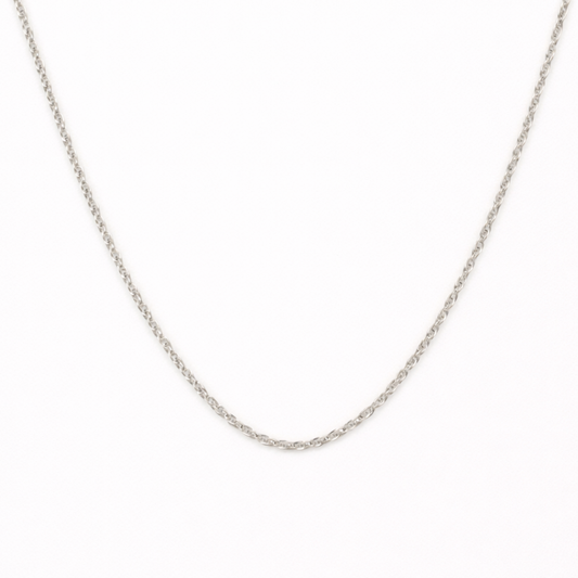 The Salty Dreamers Necklace | Create Your Own Silver features a thin stainless steel chain with small interlocking links, shown against a plain white background—an ideal choice for fans of subtle surfer jewelry.