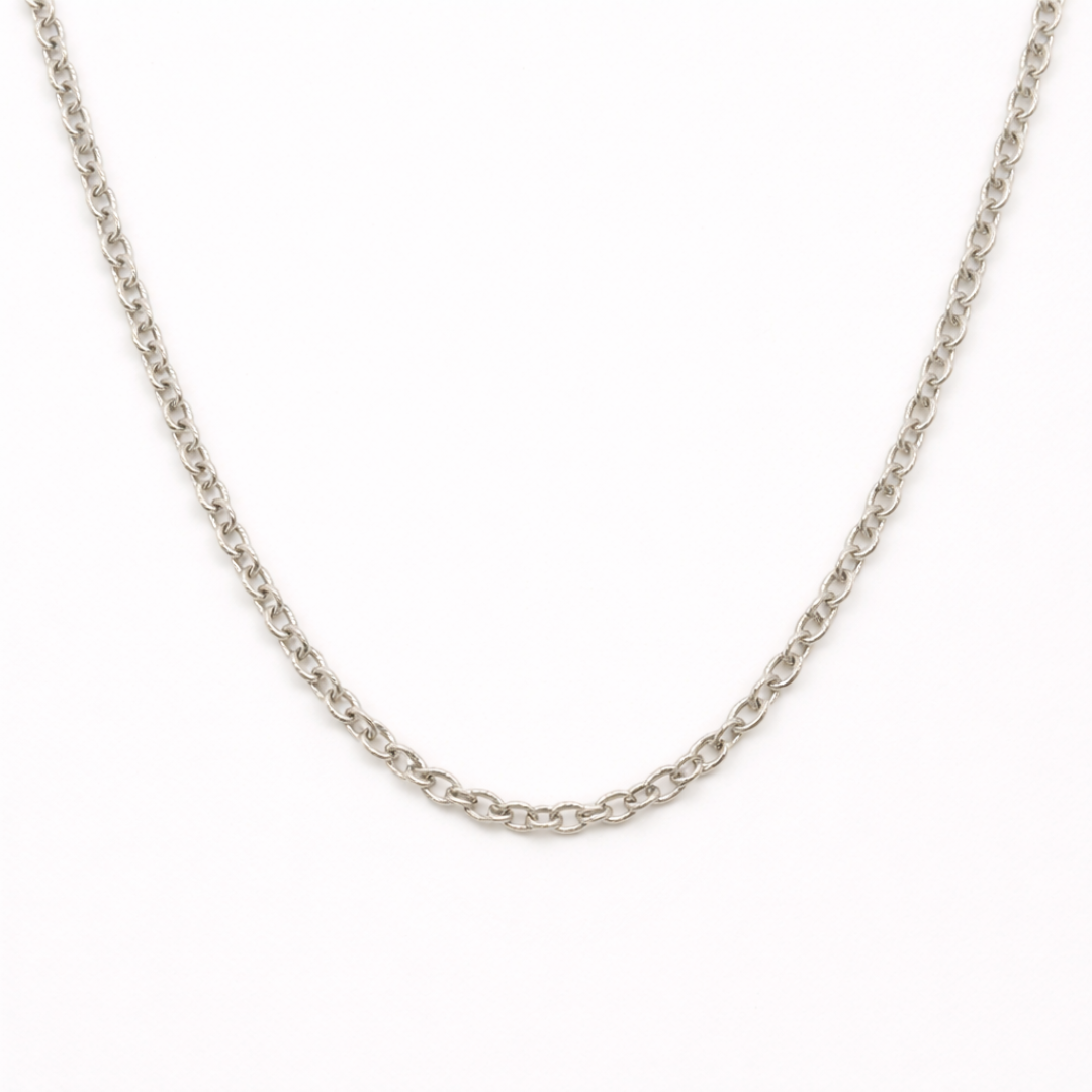 The Salty Dreamers "Create Your Own Silver" necklace features small, round links in a simple handmade silver chain, displayed on a plain white background.