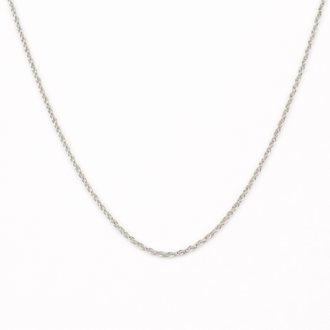The Salty Dreamers Necklace | Create Your Own Silver features a thin stainless steel chain with small interlocking links, shown against a plain white background—an ideal choice for fans of subtle surfer jewelry.