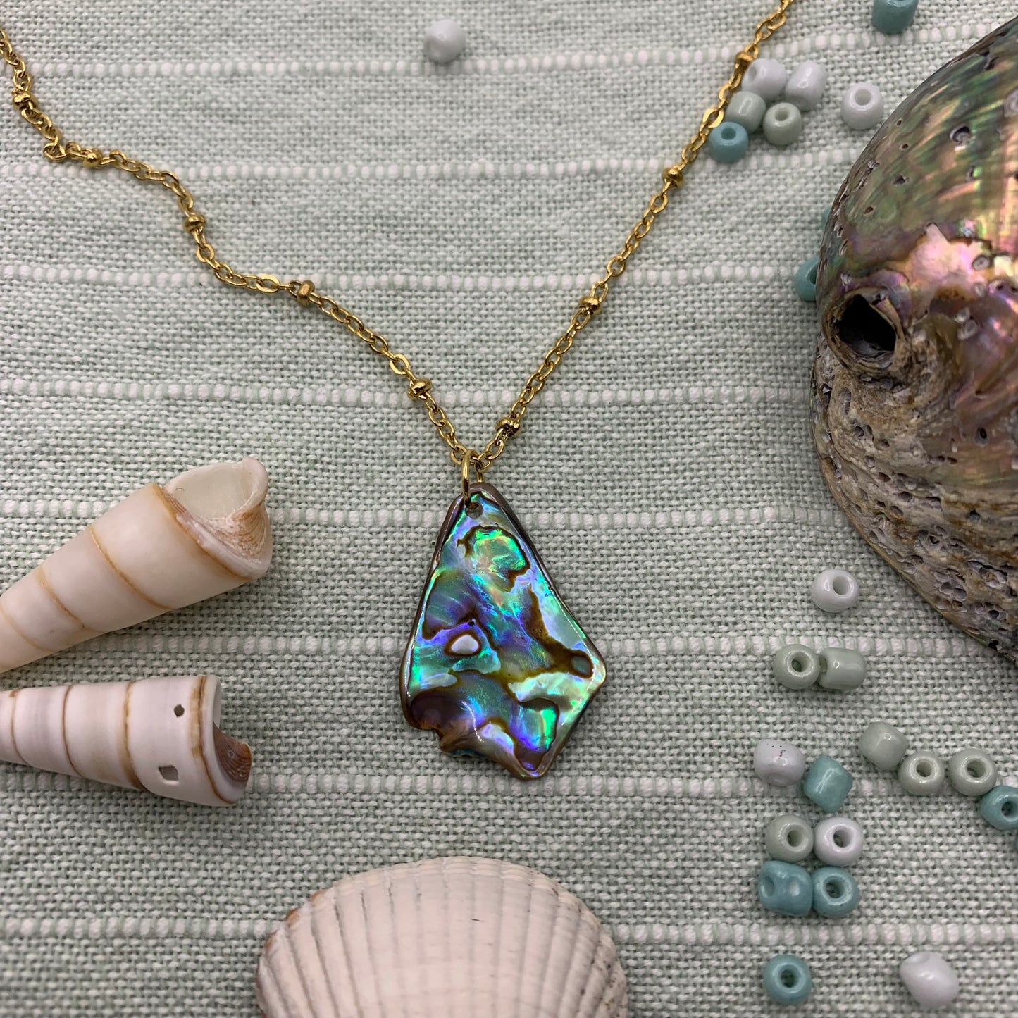 Necklace | paua shell 50 cm golden stainless steel